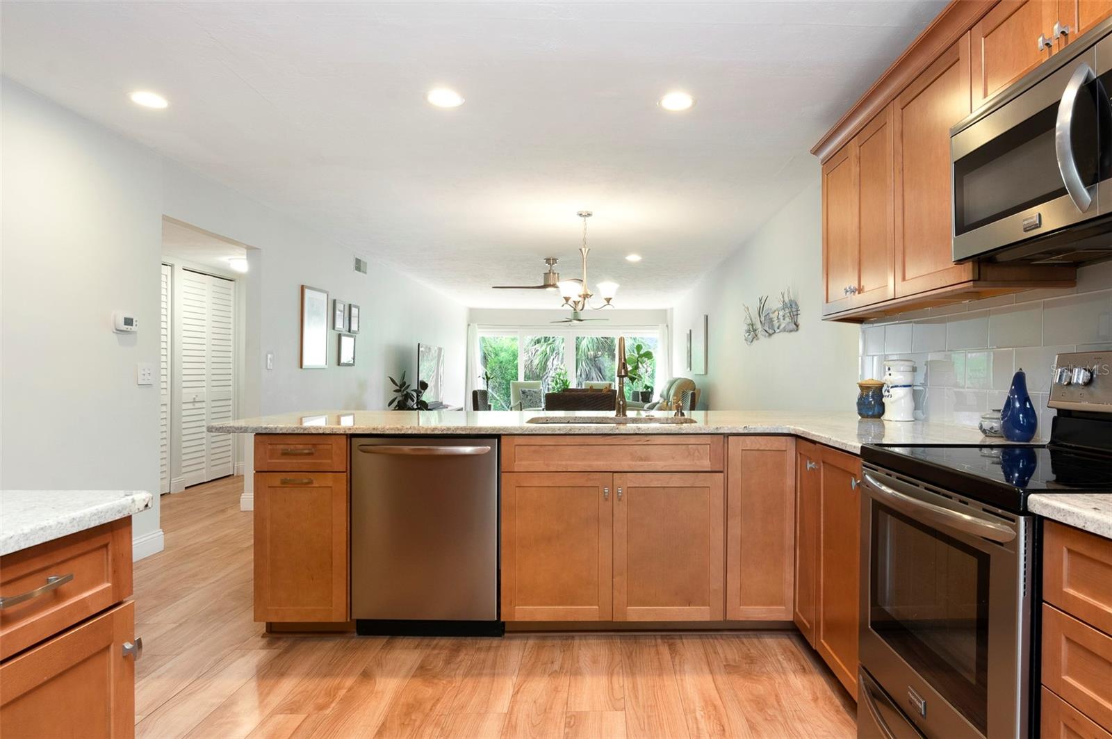 Ease of enertaining Kitchen open to the greenroom