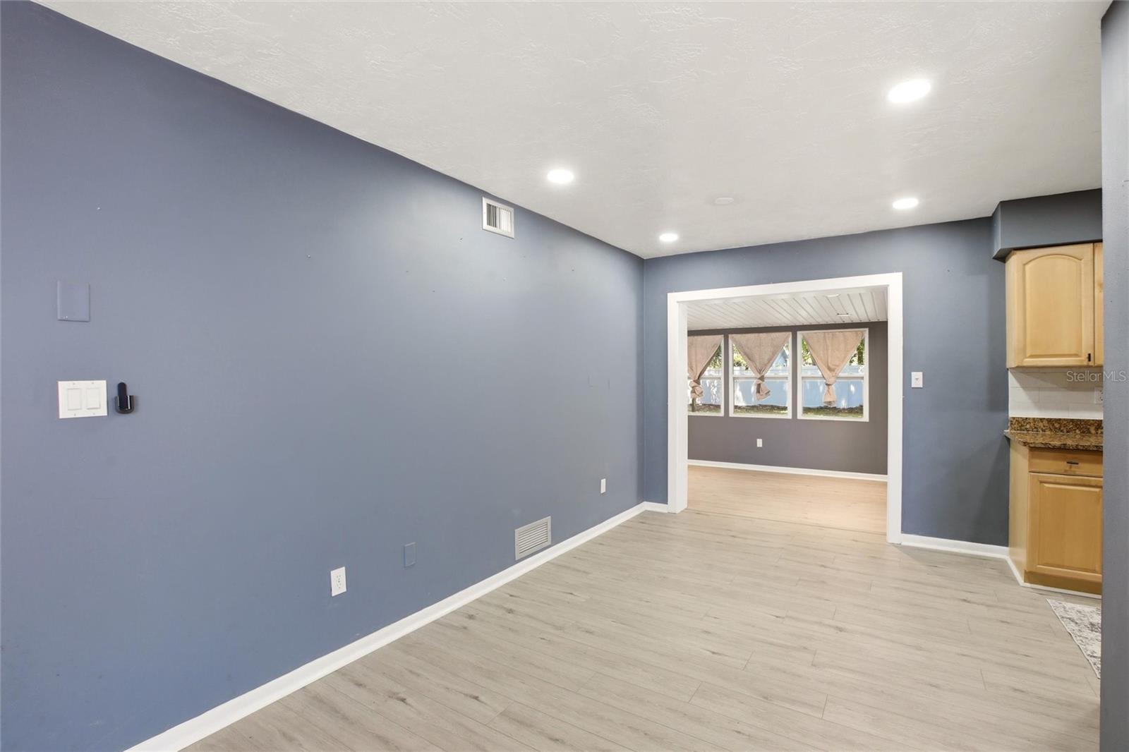 View from front area towards back of house and Florida room
