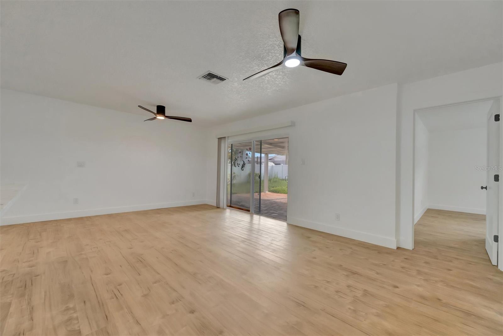 The Living Room and the Door leading to the Master Bedroom
