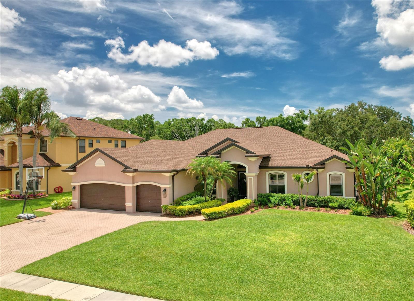 Desirable triple-split floor plan offering privacy for family and guests.