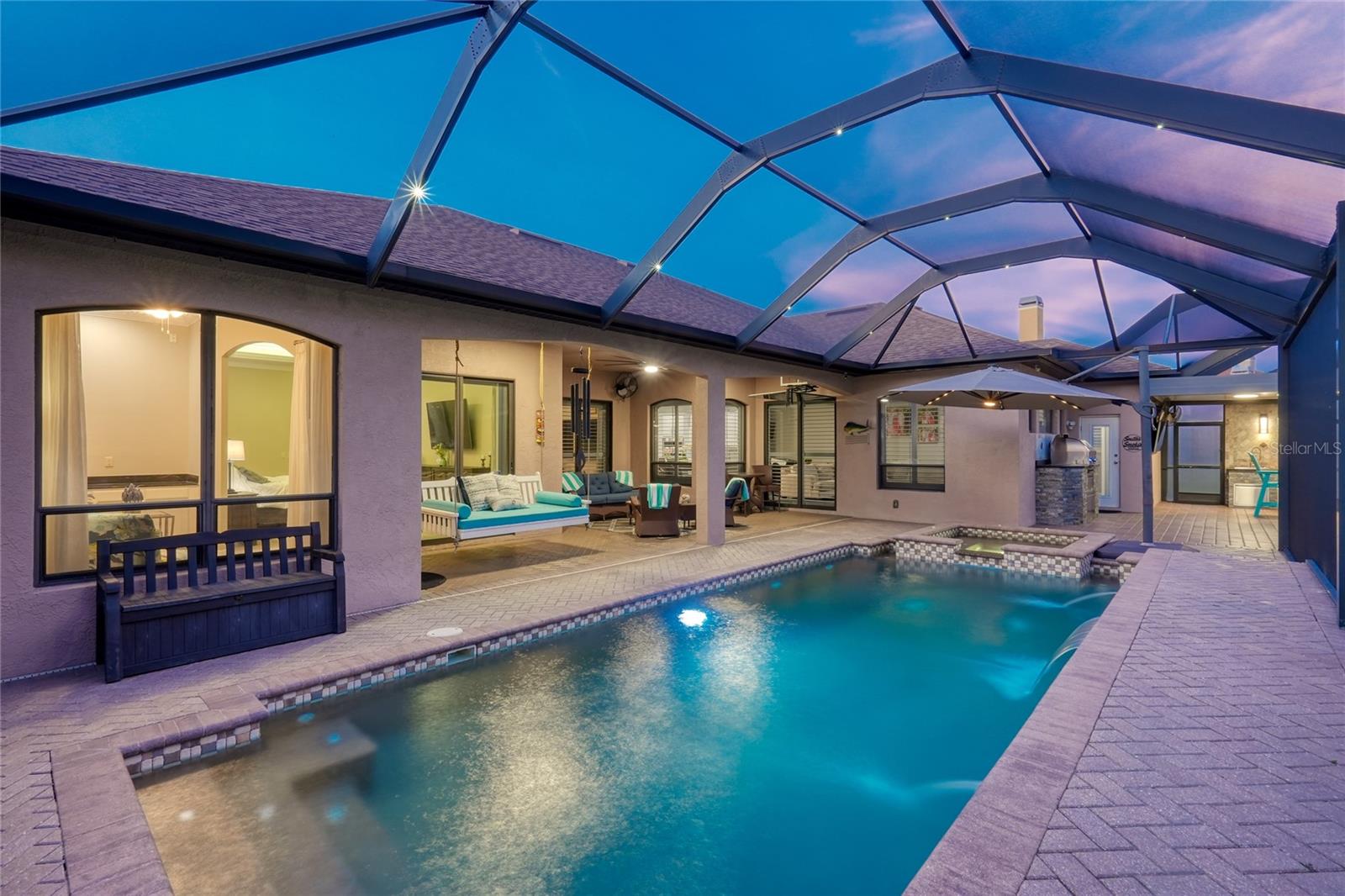 Resort-style pool with expansive outdoor living space