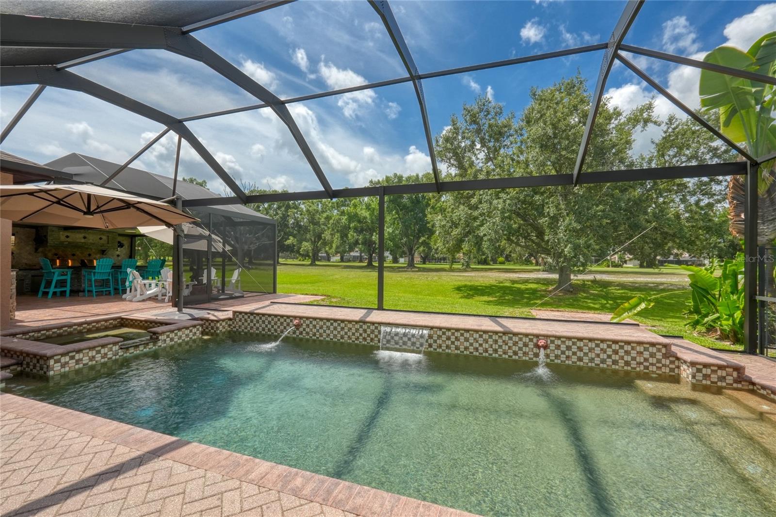 Listen to the water feature and take in the view of the golf course