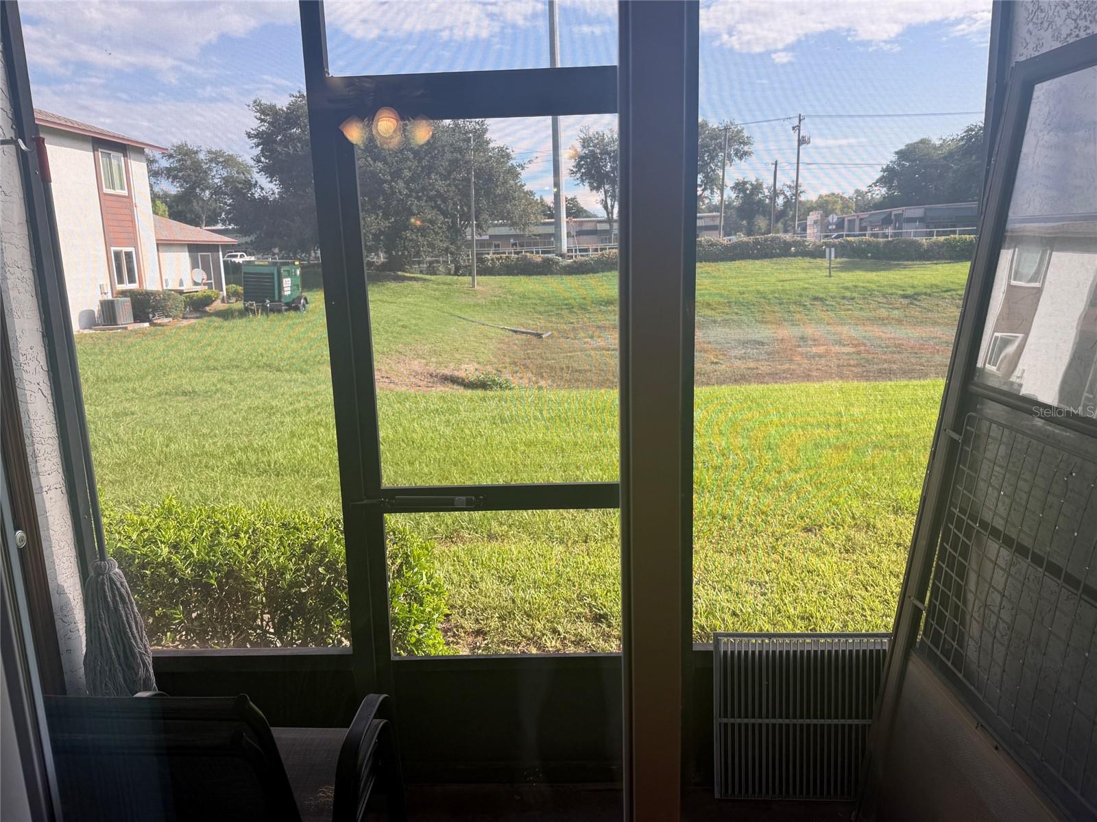 SCREENED PATIO W/POND VIEW