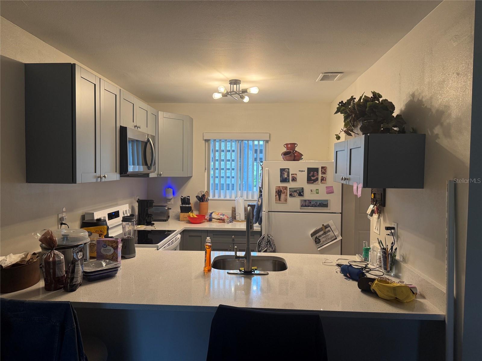 KITCHEN VIEW FROM LIVING ROOM