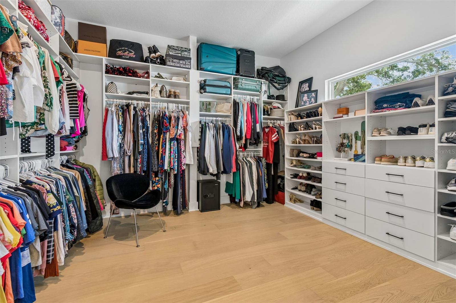 Primary massive walk-in Closet