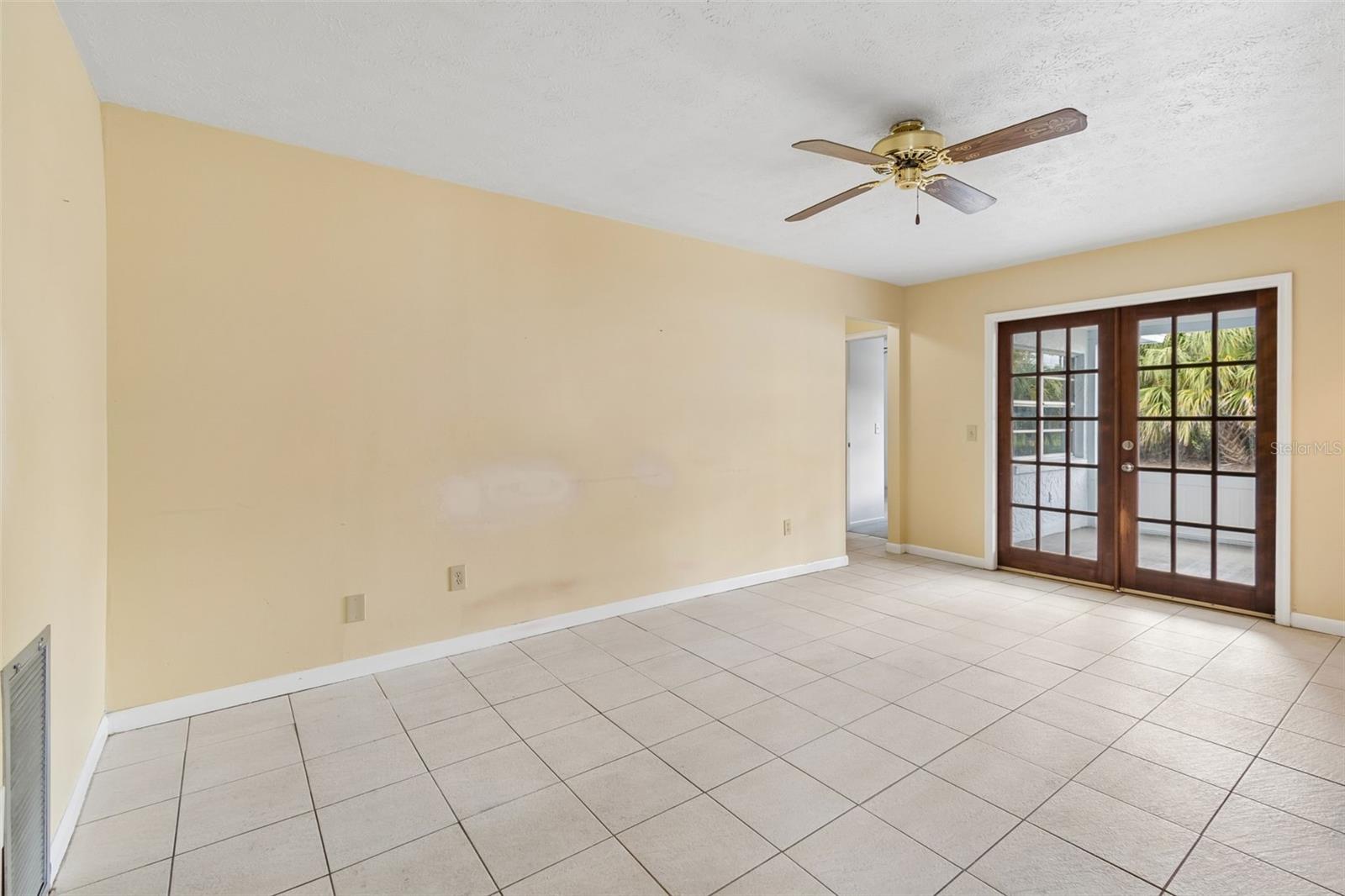 Family room with double glass door acces to your outdoor entertaining area.