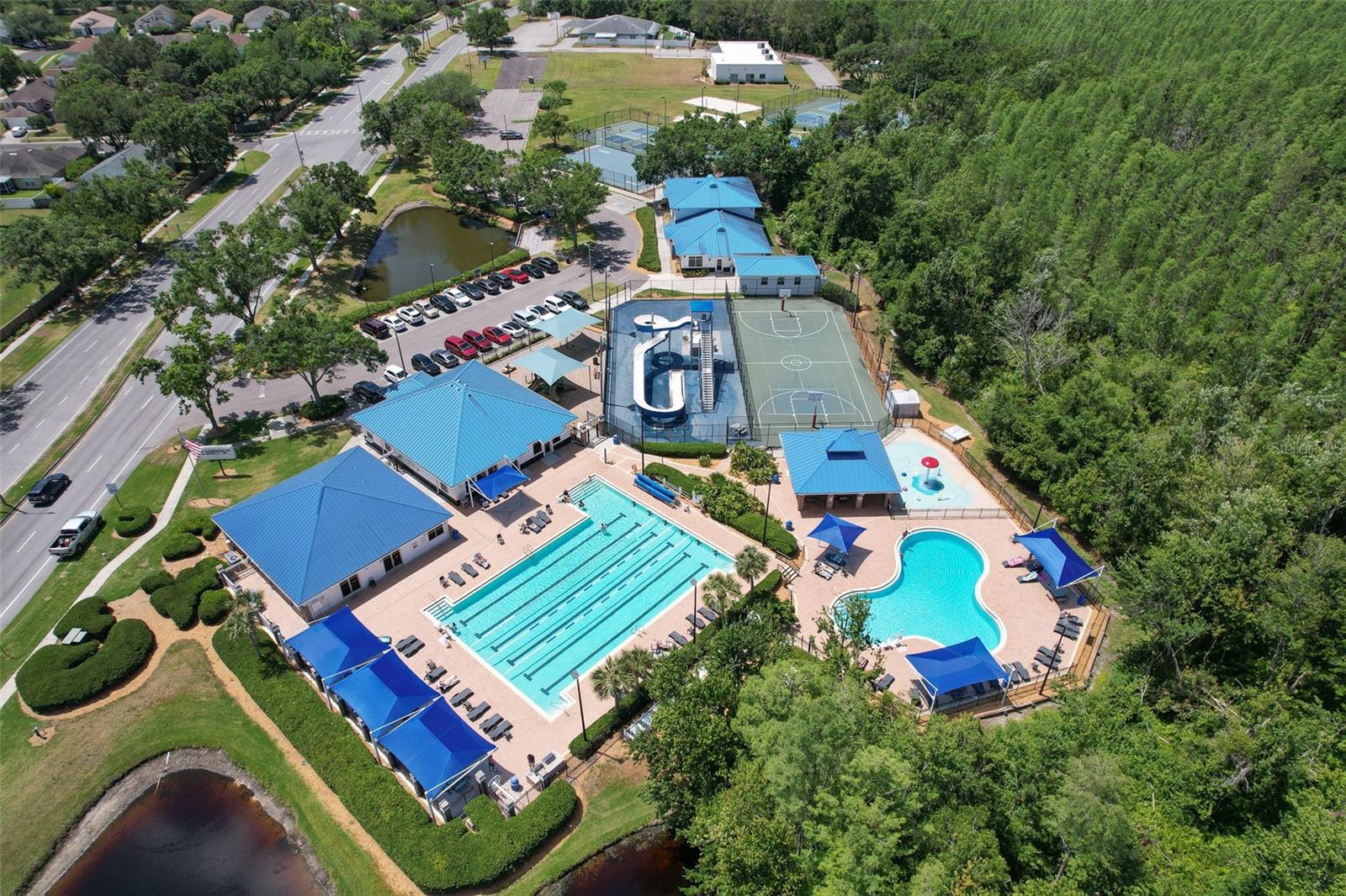 Aerial of pools and courts