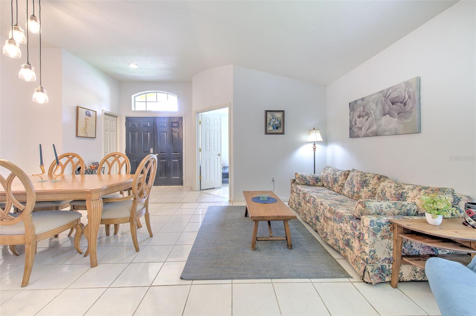 View of Formal living and dining facing front entrance