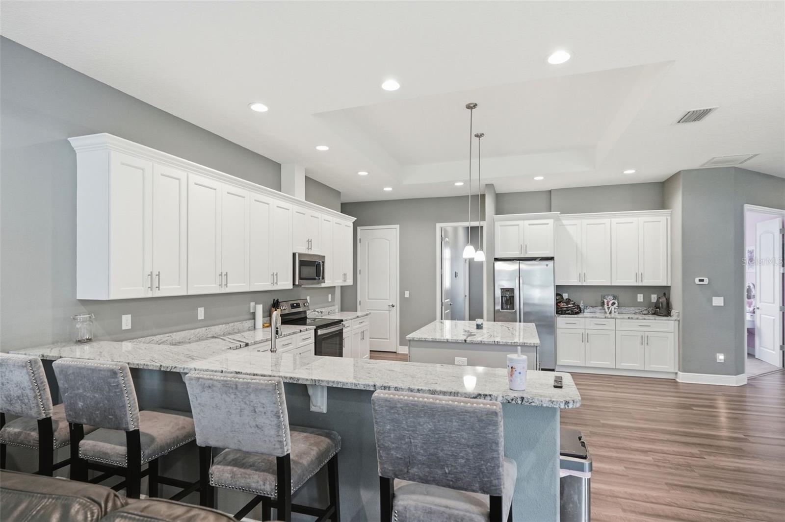 Large Kitchen with an endless amount of cabinets and storage space!