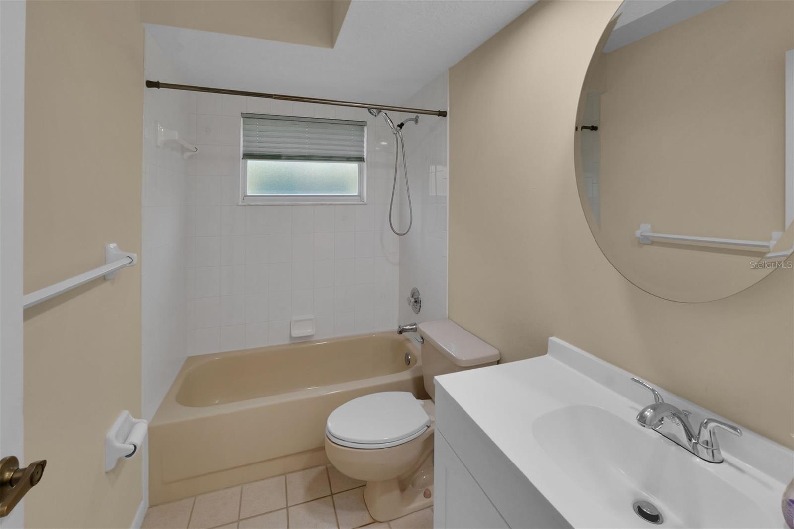 Bathroom 2-tub/shower combo
