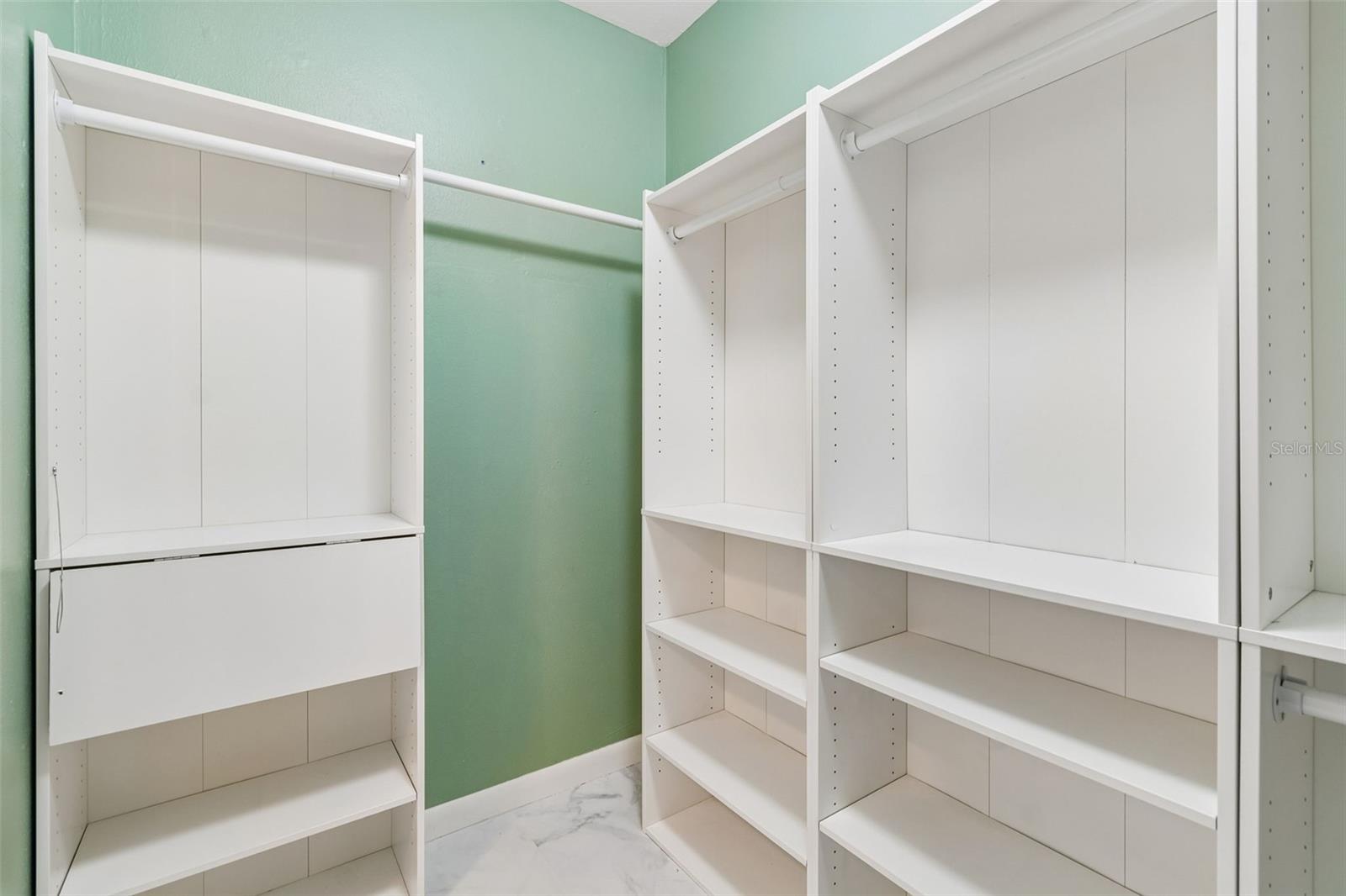 Walk In Closet with Built In Shelves