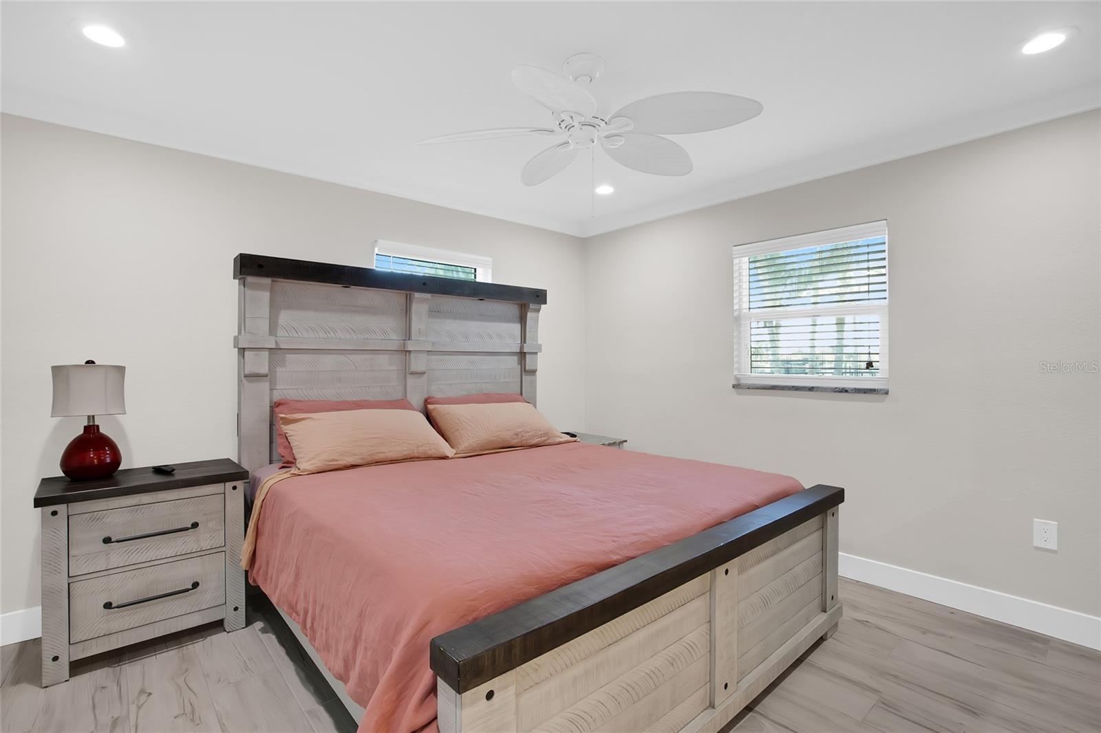KING SIZE PRIMARY.   PORCELAIN TILES THROUGH OUT ENTIRE HOME - UPDATED WINDOWS + BLINDS