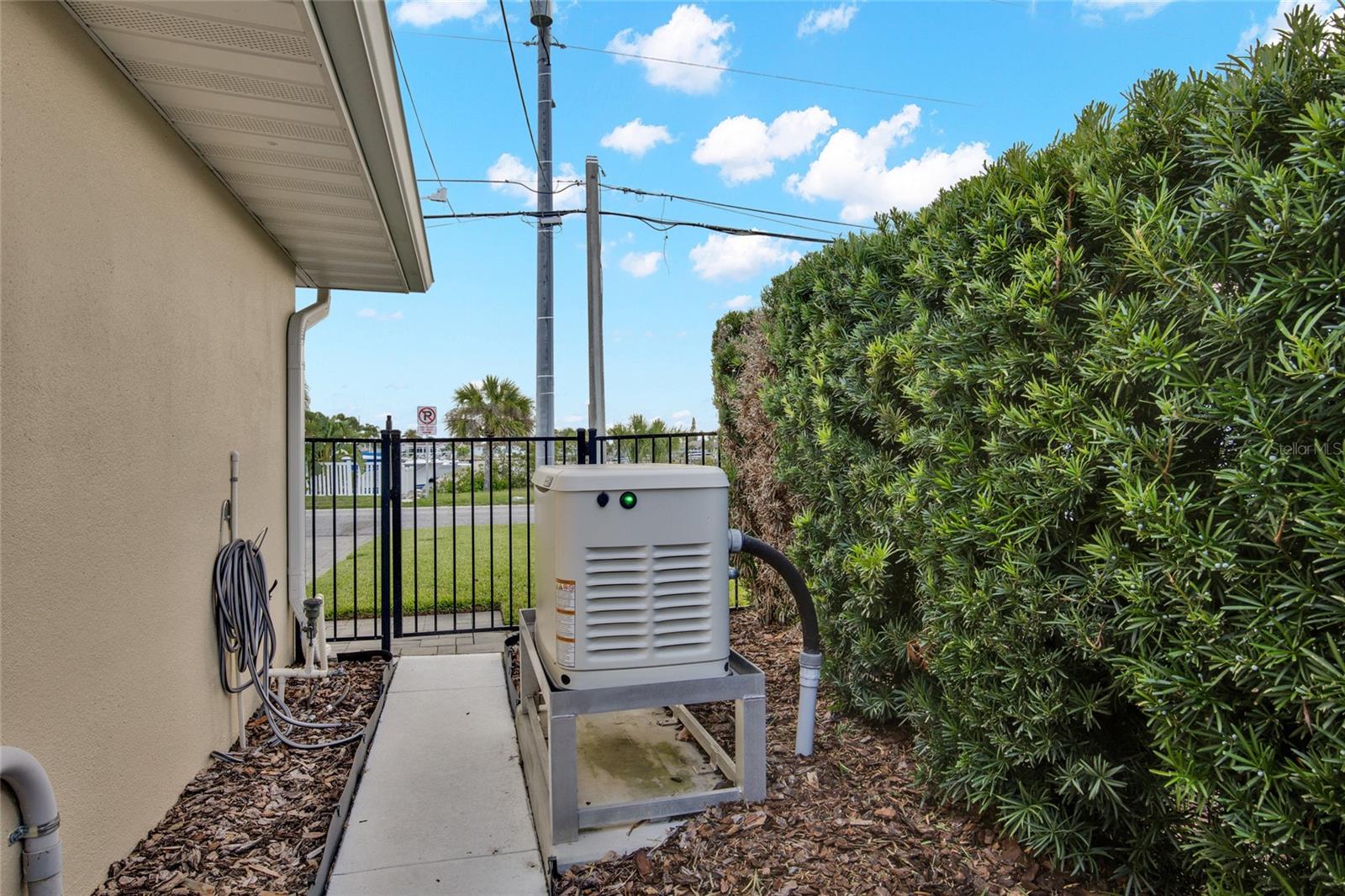 GENERAC GENERATOR FOR WHOLE HOME POWER IN CASE THE POWER GOES OUT. YOU ARE COVERED.  PROPANE TANK HOLDS 250 GALLONS