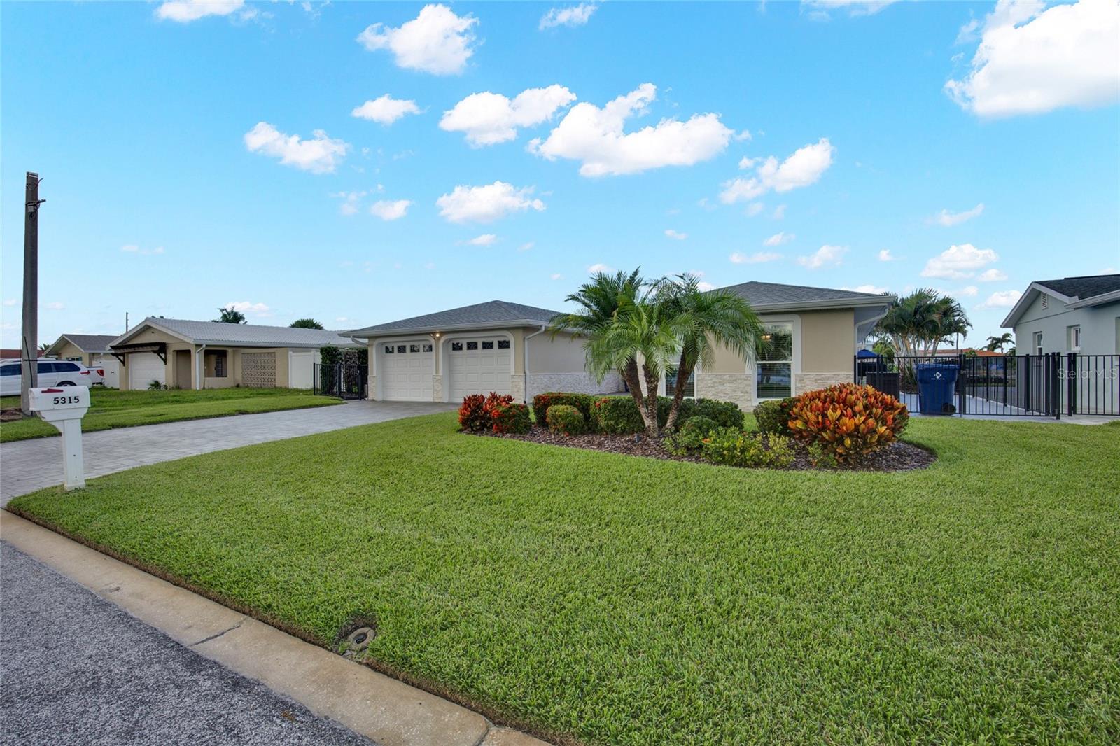 BEAUTIFULLY LANDSCAPED.  GOOD LOOKING CURB APPEAL
