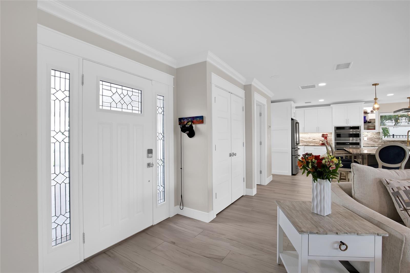 FRONT ENTRY.  PROCELAIN TILE THROUGHOUT THE WHOLE HOME - RING SYSTEM