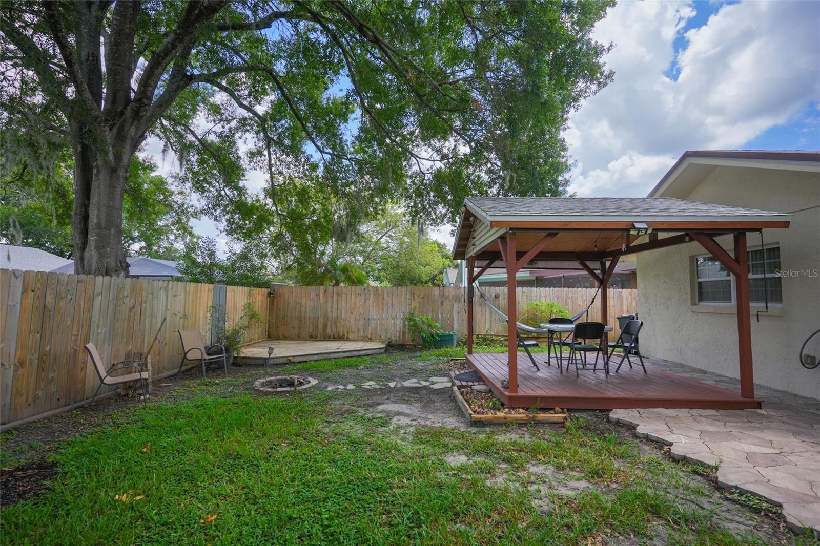Backyard with Gazebo and grilling deck