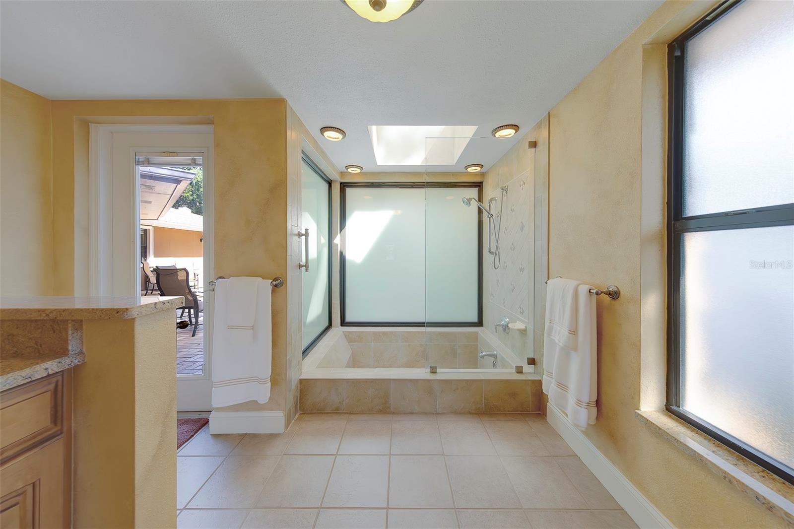 Gorgeous sunken Tub and Shower Combo