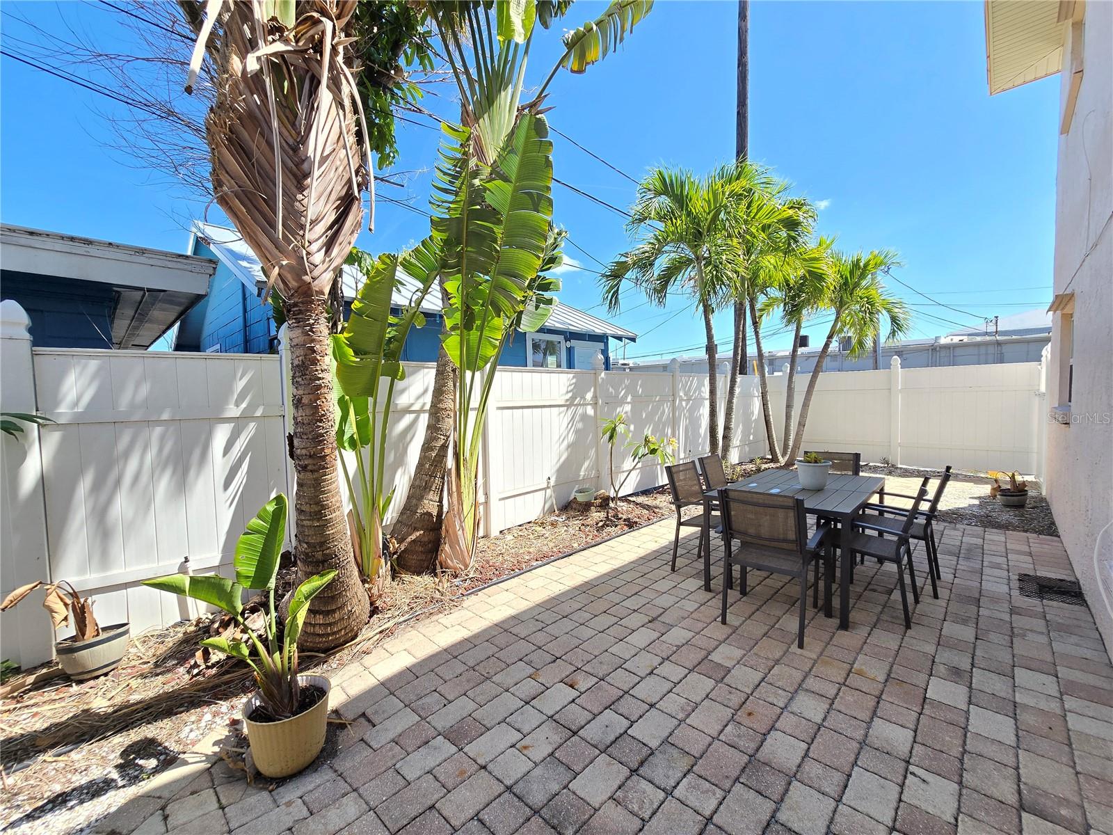 Private rear patio area with grill to enjoy the outdoors.