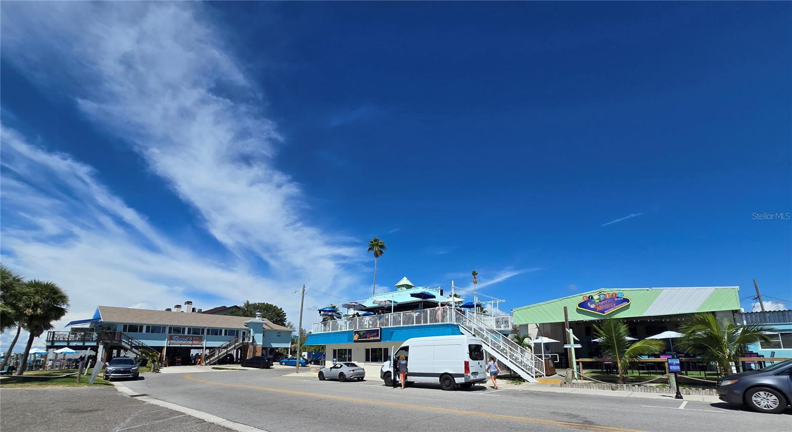 Two blocks over from Sunset Park are The Toasted Monkey and Buoy's, both great for food, music and amazing views.