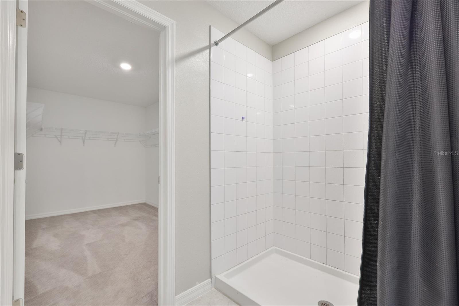 Primary Shower looking into the Primary Closet