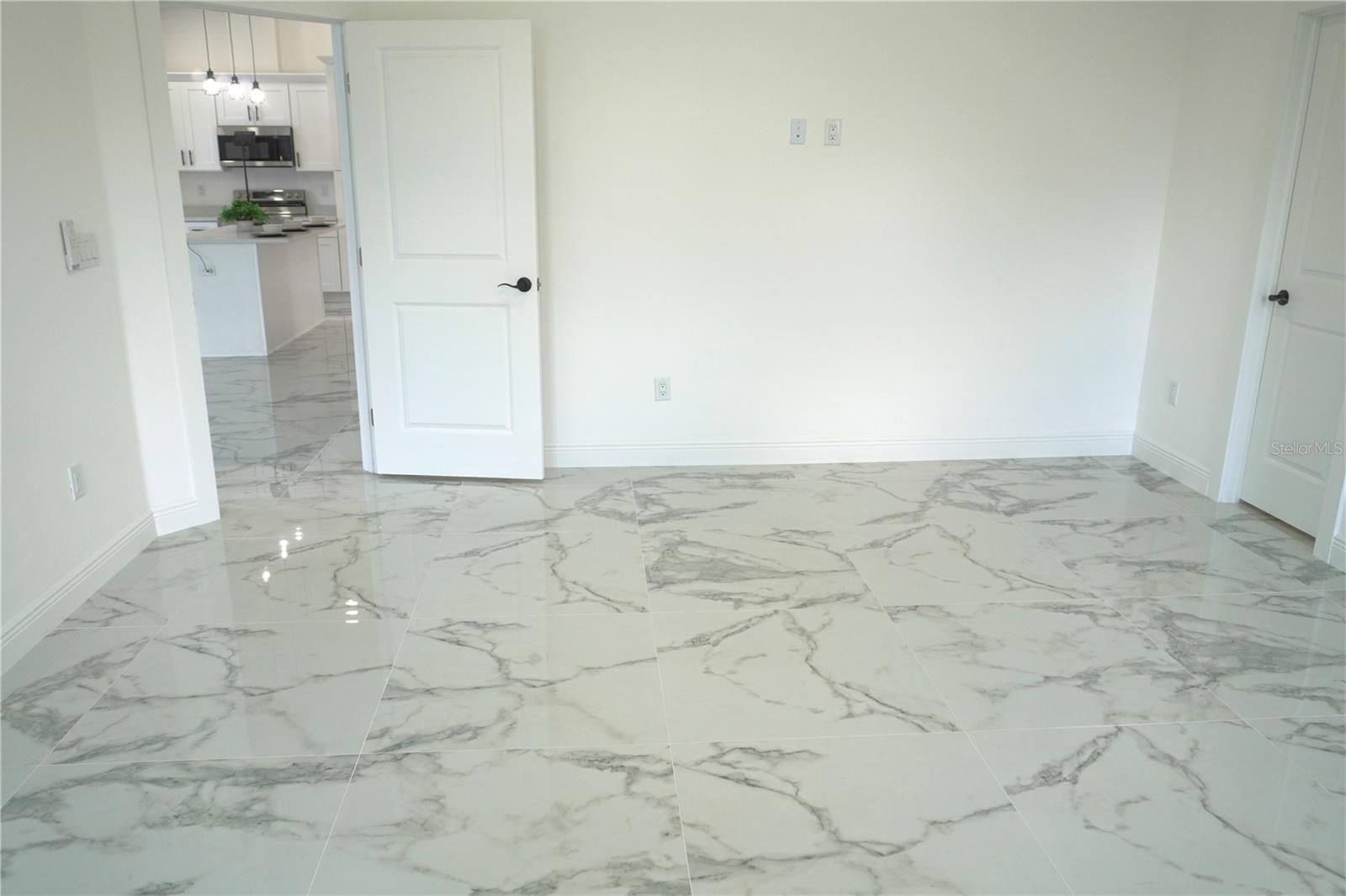 Primary bedroom off kitchen/dining room
