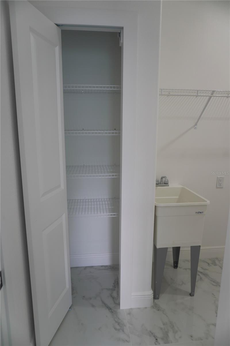 Laundry room linen closet