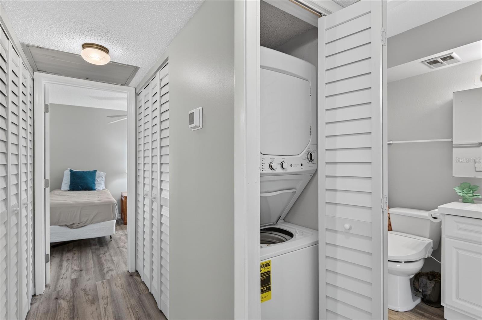 Hallway to Bedroon 2, Laundry Closet and Bathroom