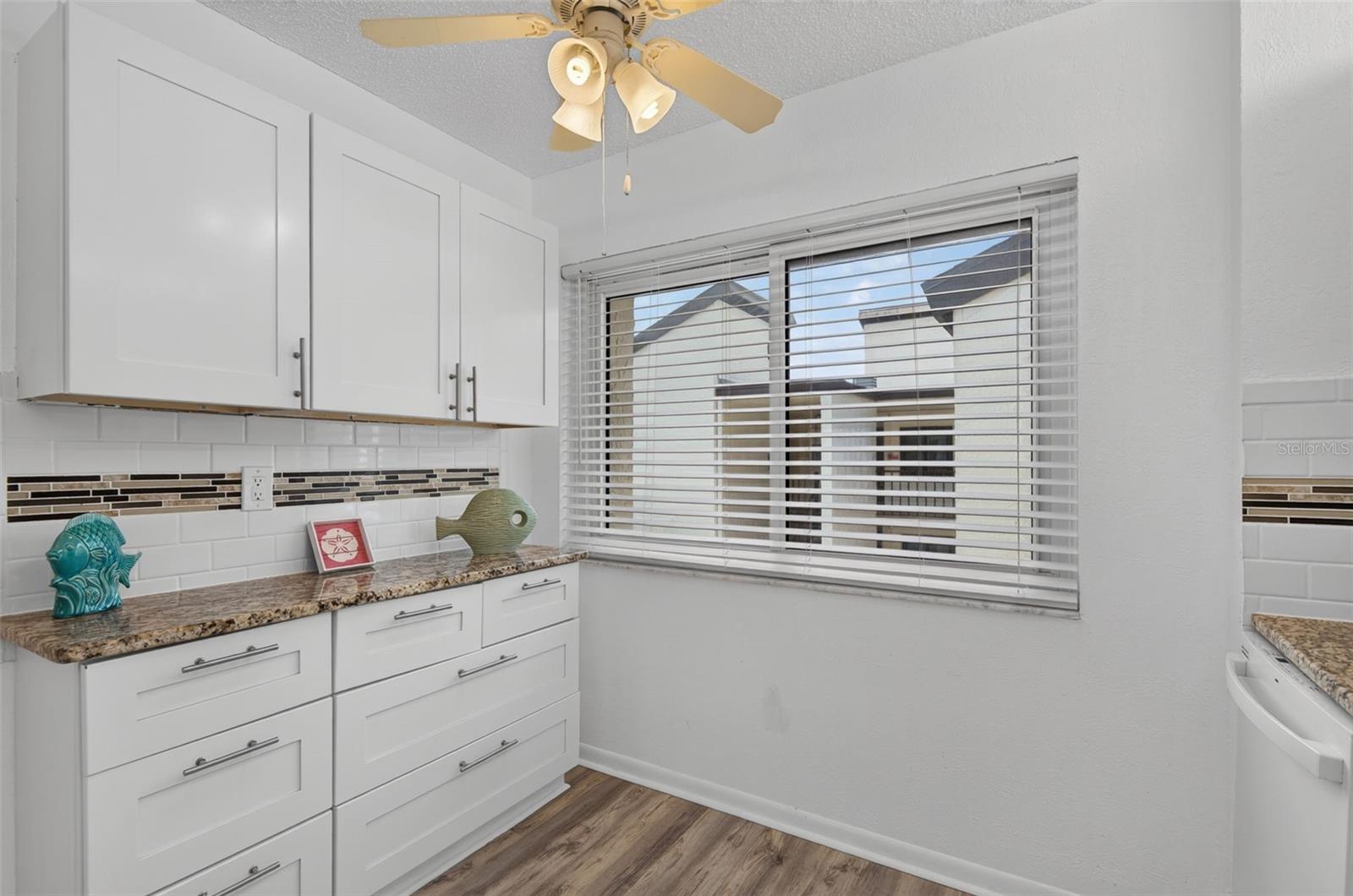 The kitchen is light and bright with plenty of storage