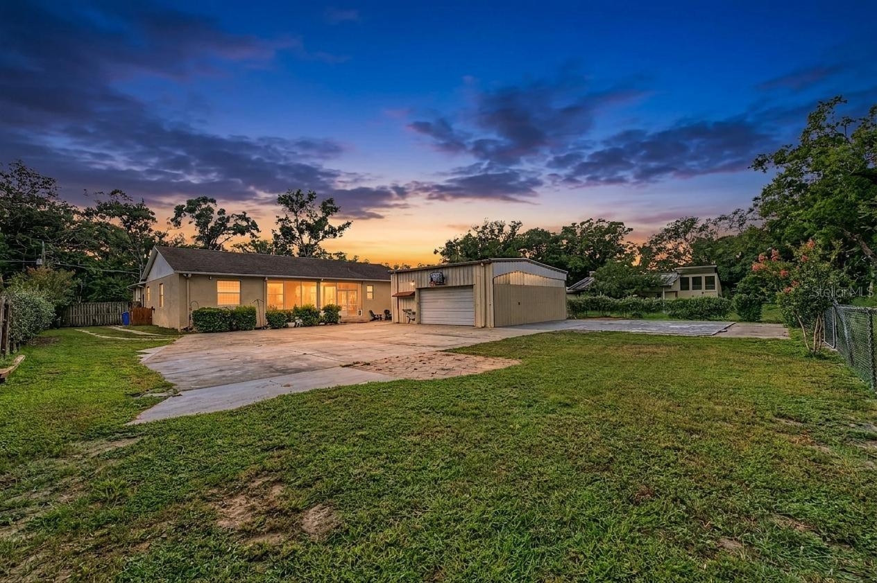 Super large lot, almost an acre with a huge workshop/garage in the back.