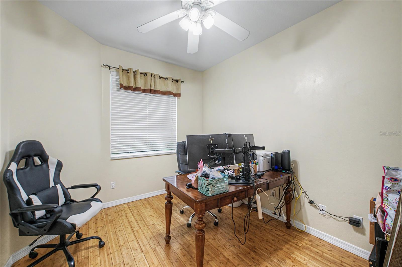 Office with Bamboo Flooring, ceiling fan (no closet- would need an armoire). or 5th Bedroom