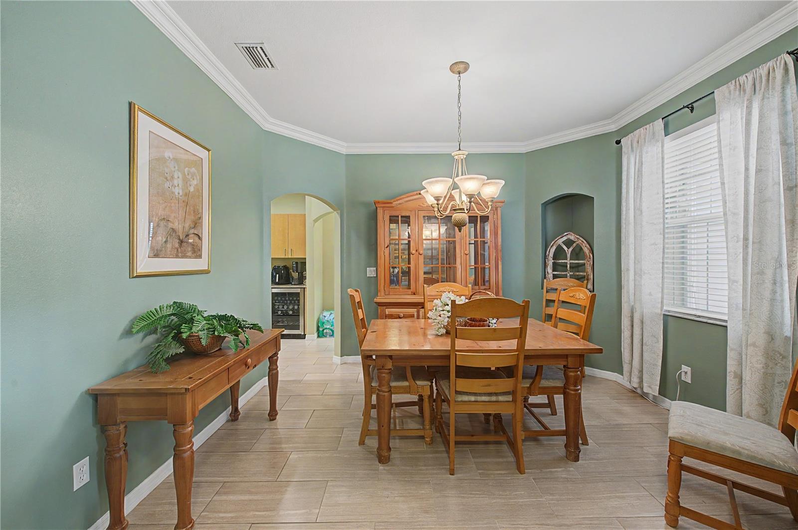 Formal Dining Room, Tile Flooring, Crown molding