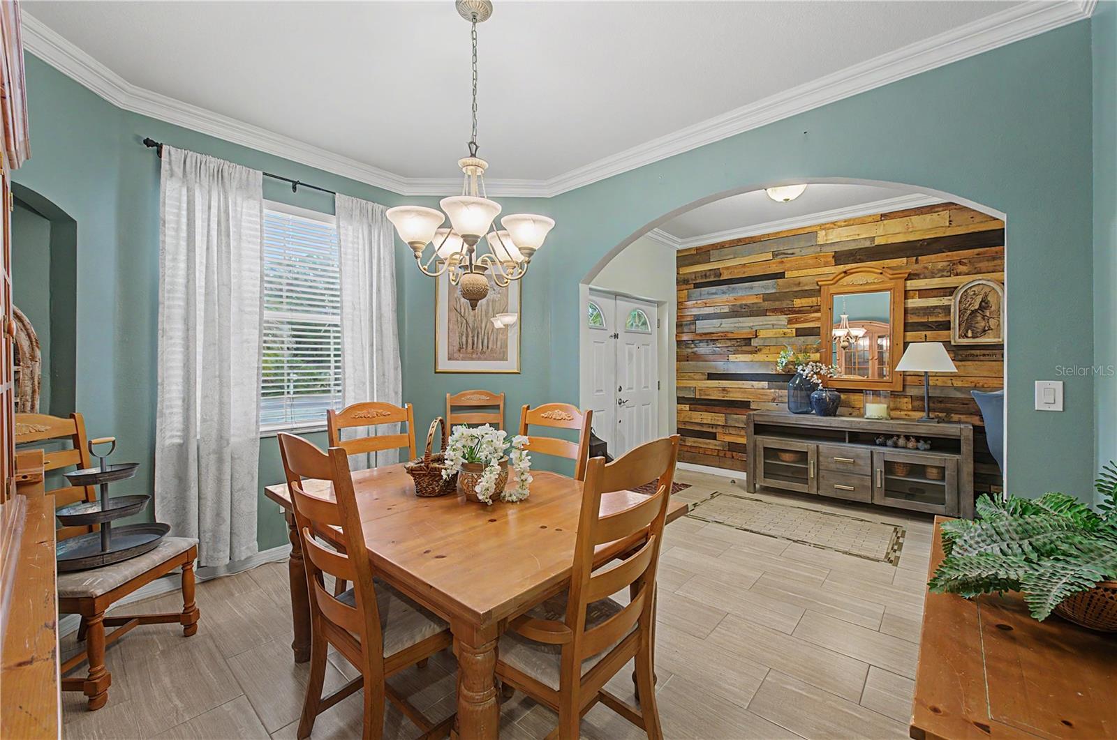 Formal Dining Room, Tile Flooring, Crown molding