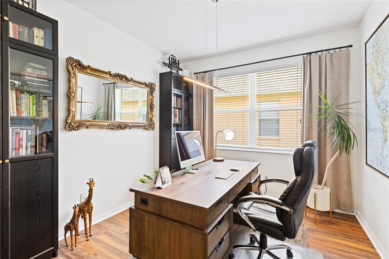 Flex space has large picture window for plenty of light.