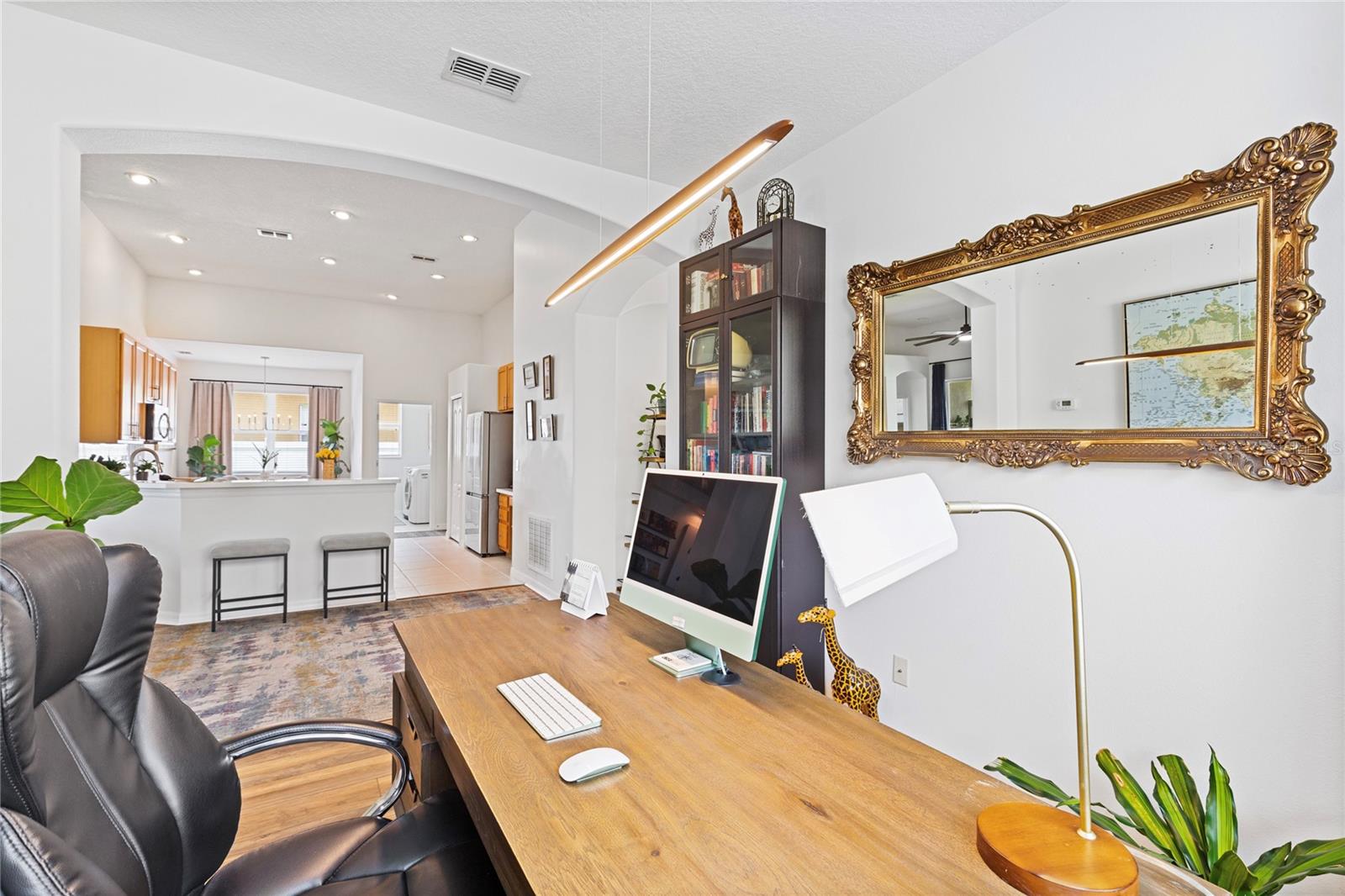 Flex space is overlooking kitchen and could be additional dining space.