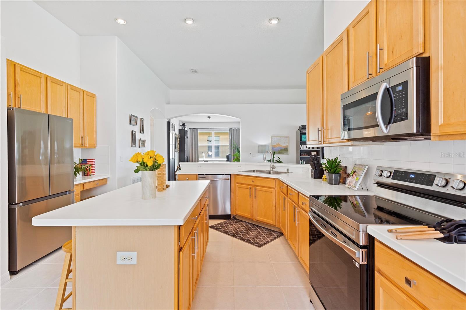 Open Airy Kitchen with 42" Cabinets for amble storage.