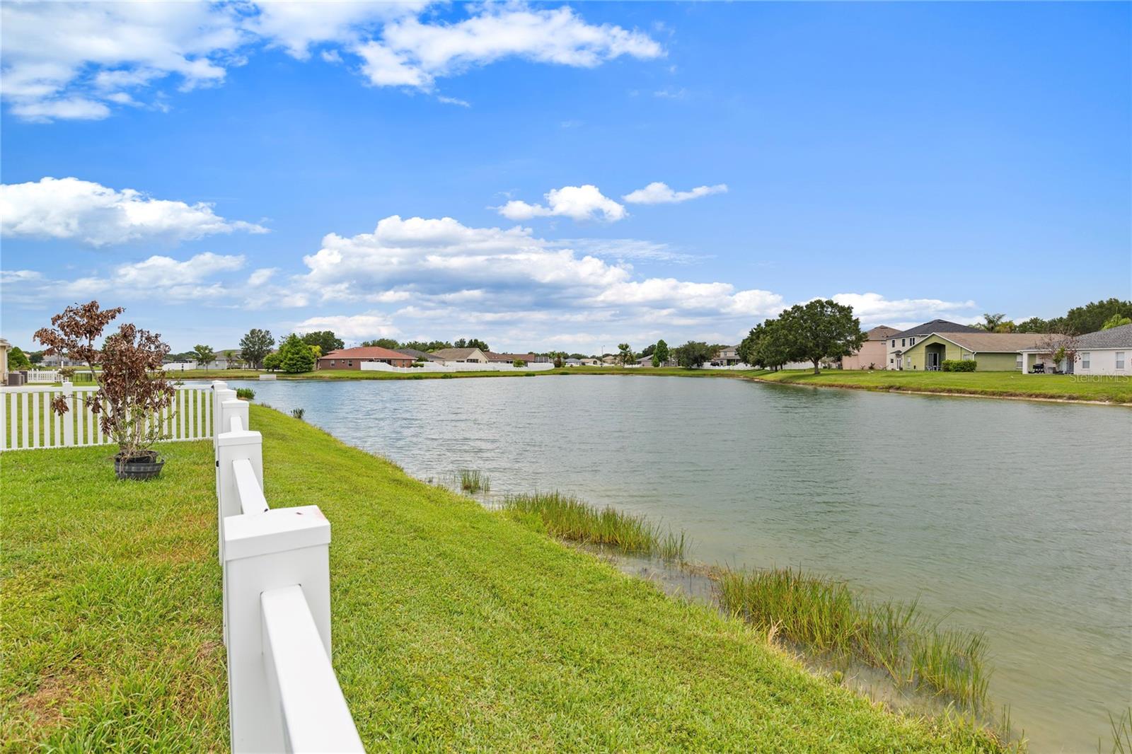 Secure fence without obstructed view of water view.