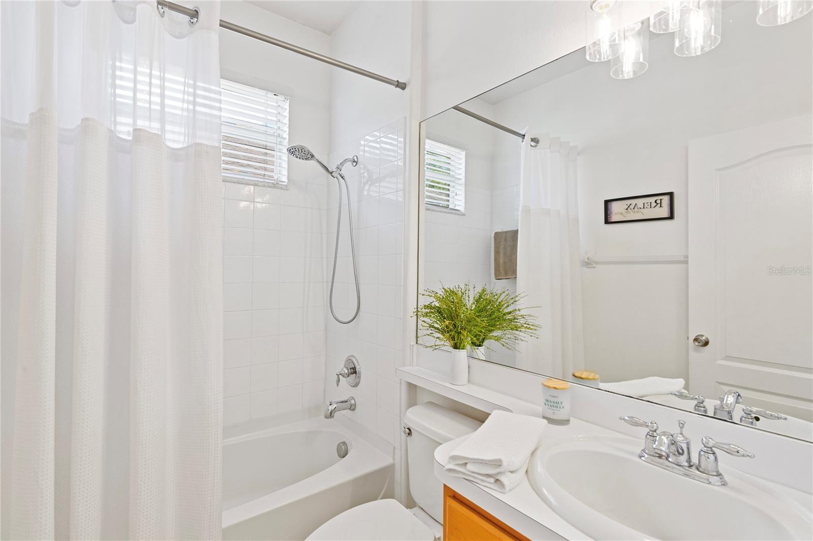 In-Law Suite/2 Guest bath with tiled shower and linen closet