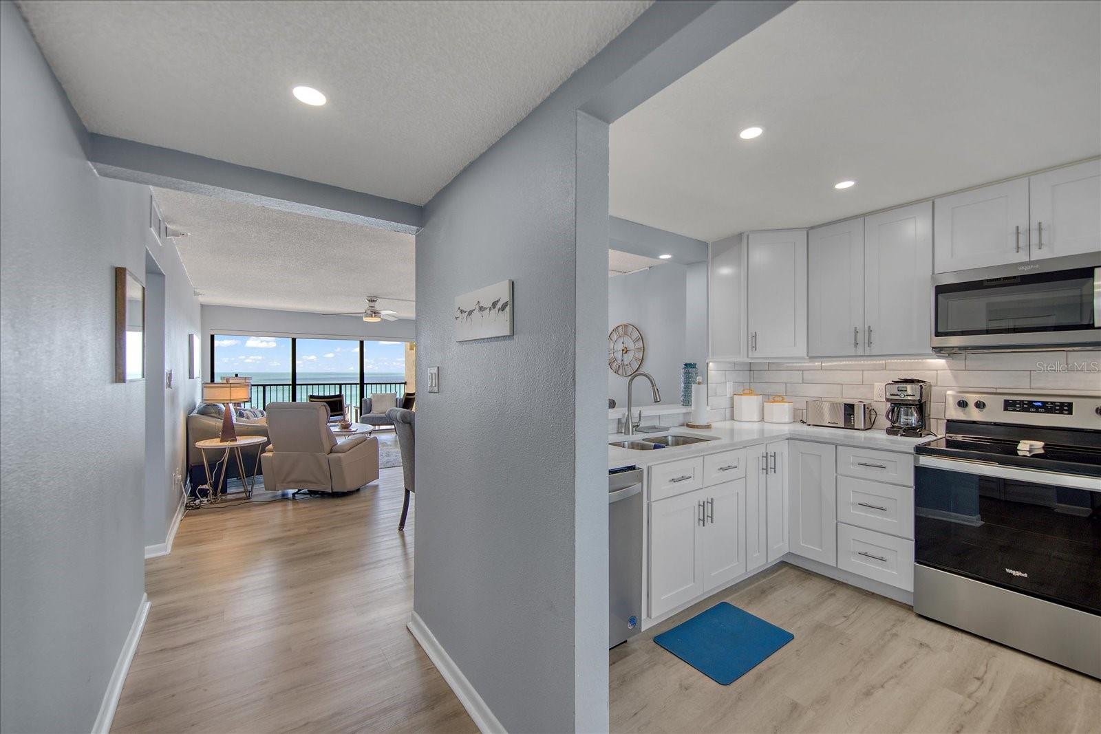 Hallway into the condo with views of the gulf