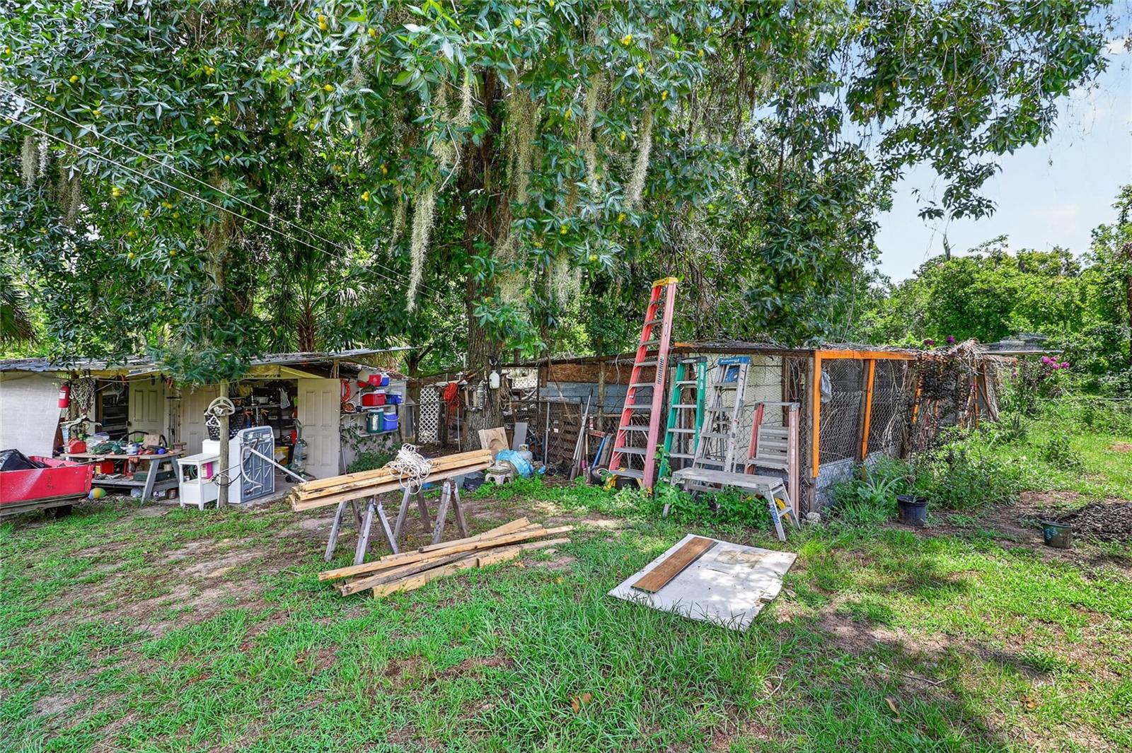 Multiple sheds and storage spaces for any and all of your hobbies and includes a dry structure for the animals currently living on property.