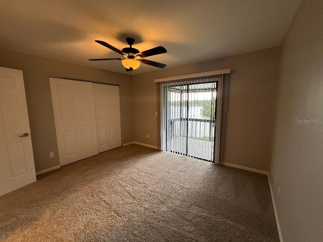 Primary bedroom with great balcony and view of Lake Heather.
