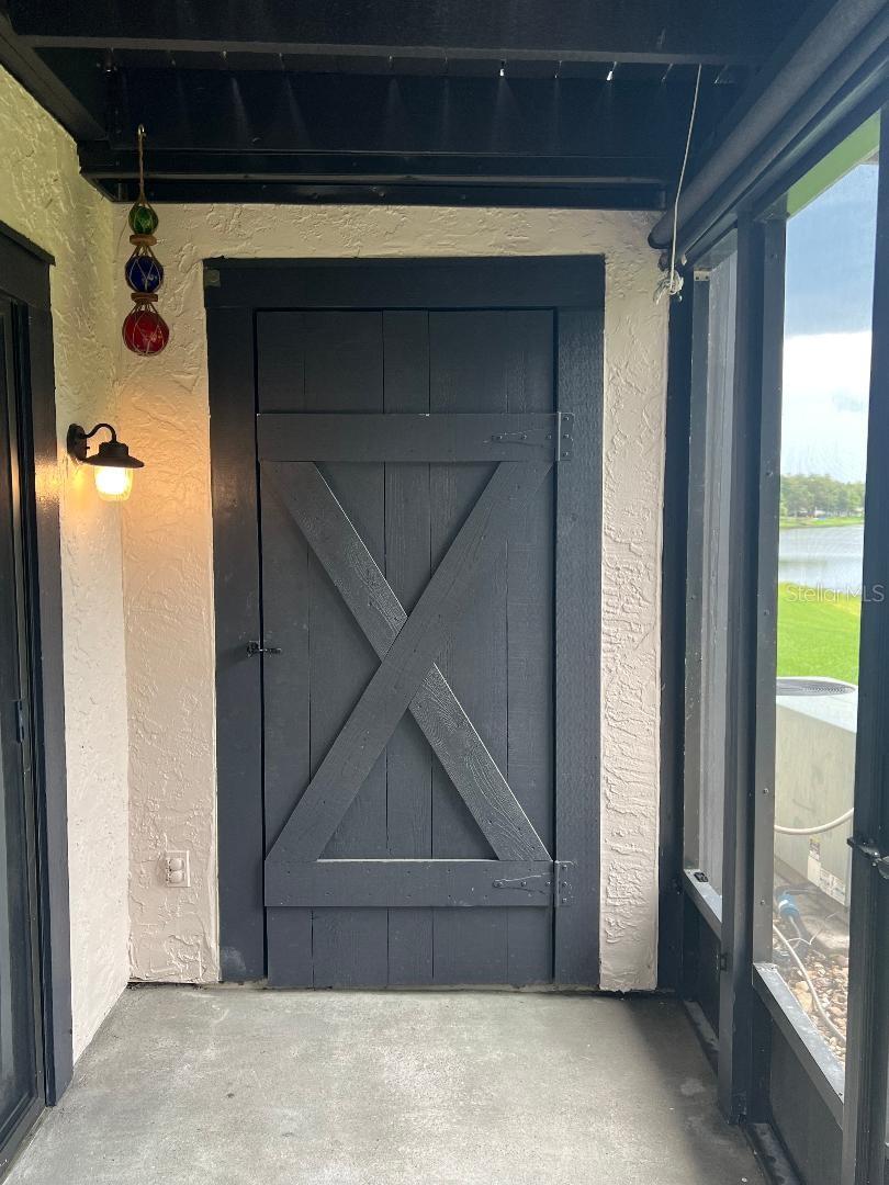 Porch storage door