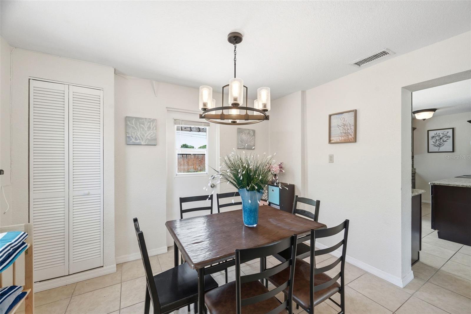 Dining Room with access to the spacious Backyard.