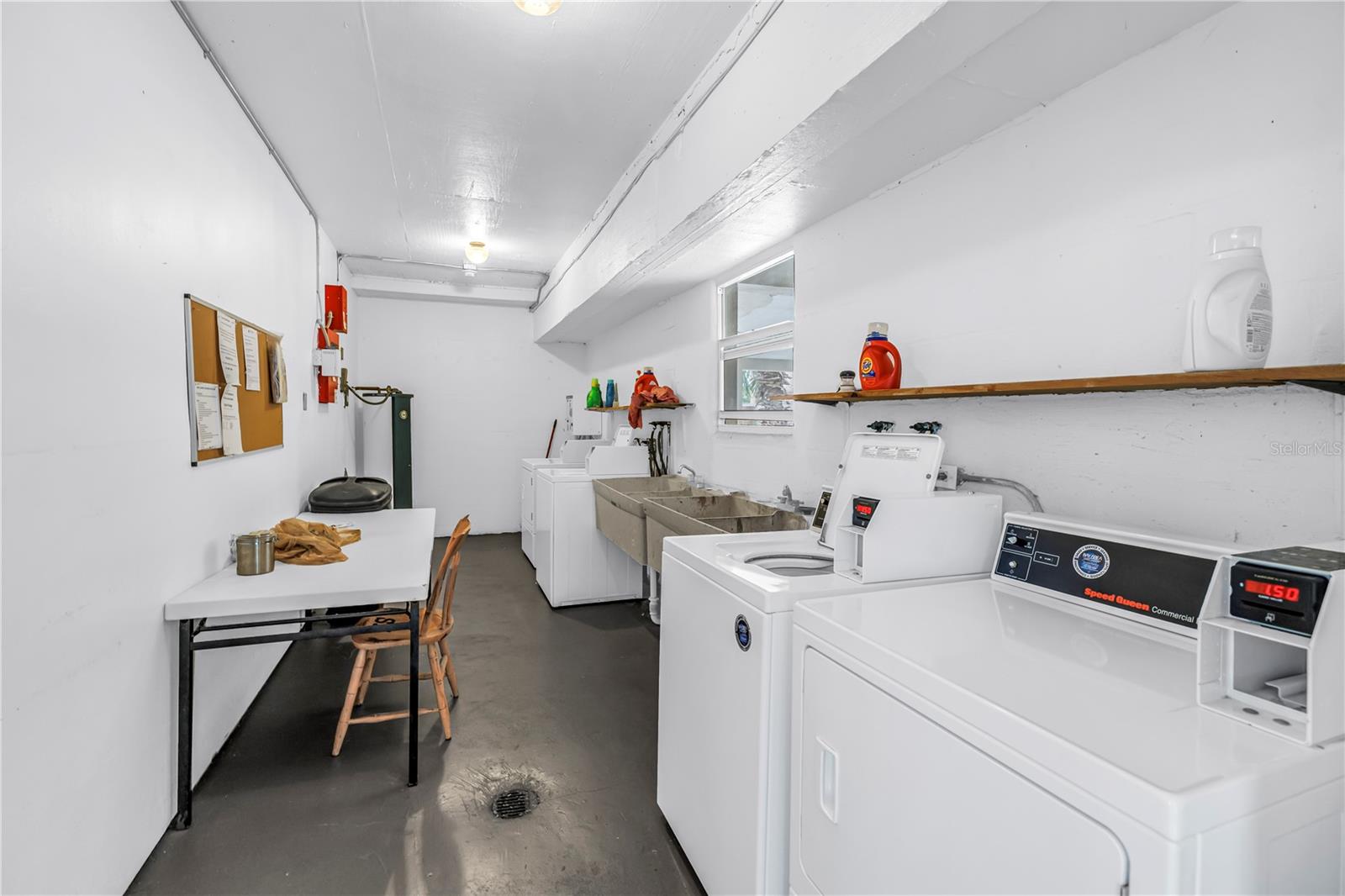 laundry room conveniently right below Unit 13