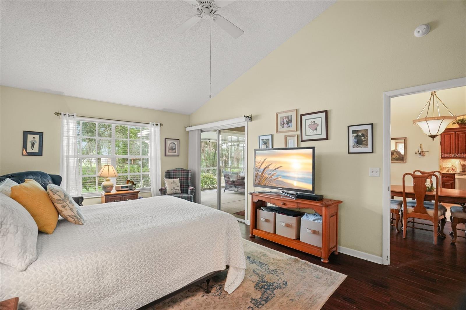 Primary suite with lake views and slider to lanai