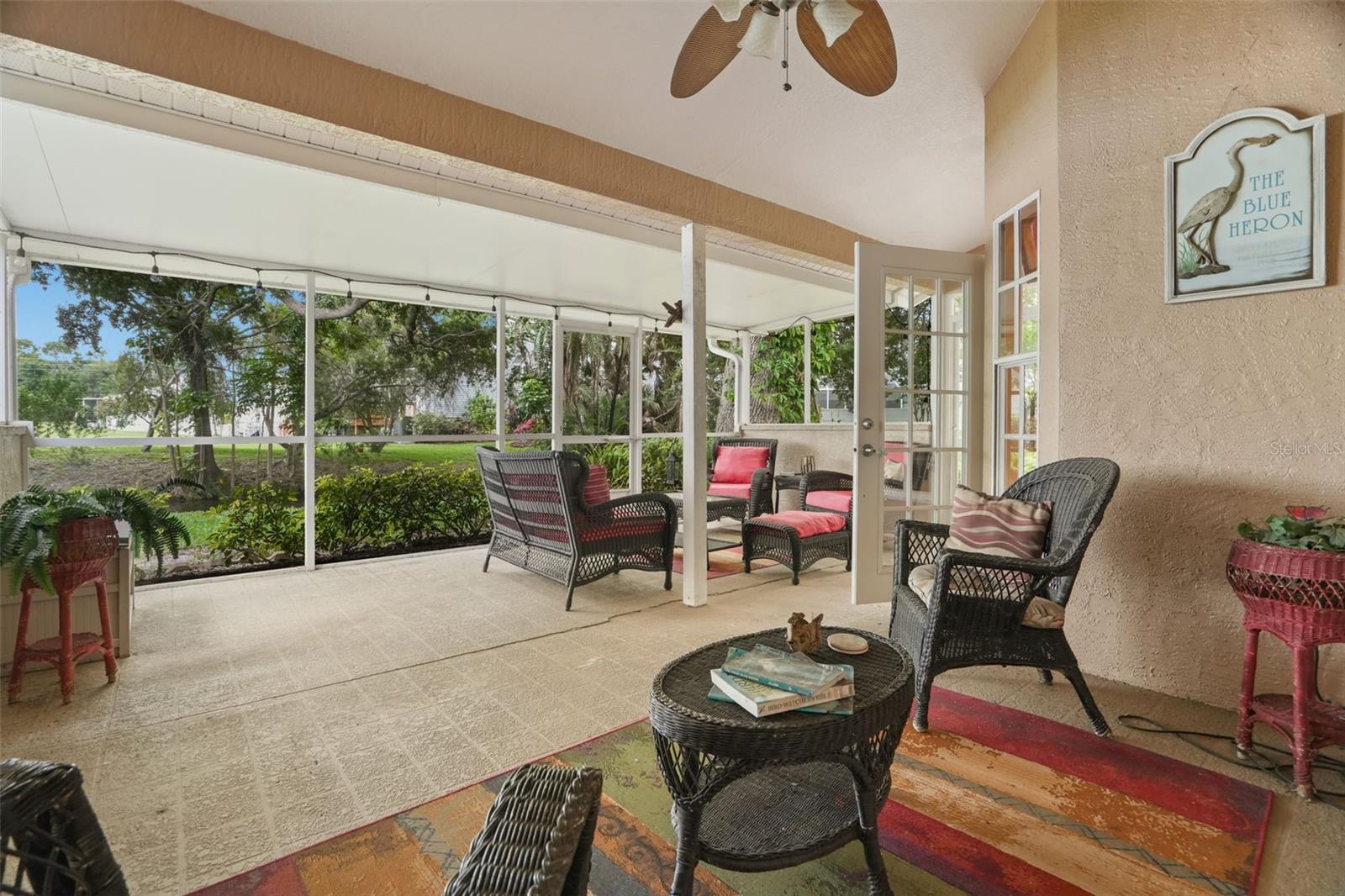 Large lanai with covered area and lake views