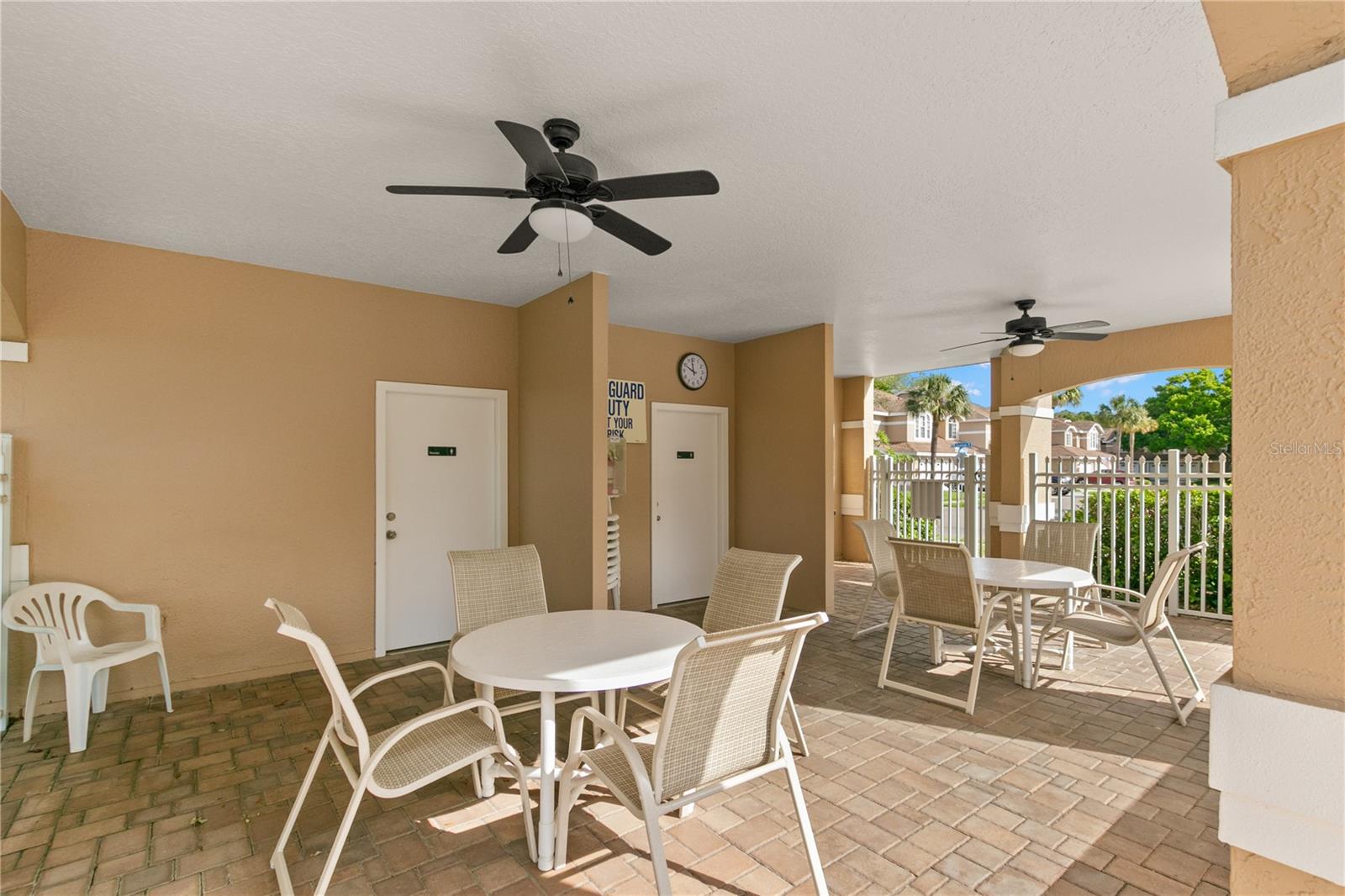Covered area at the community pool and bathrooms