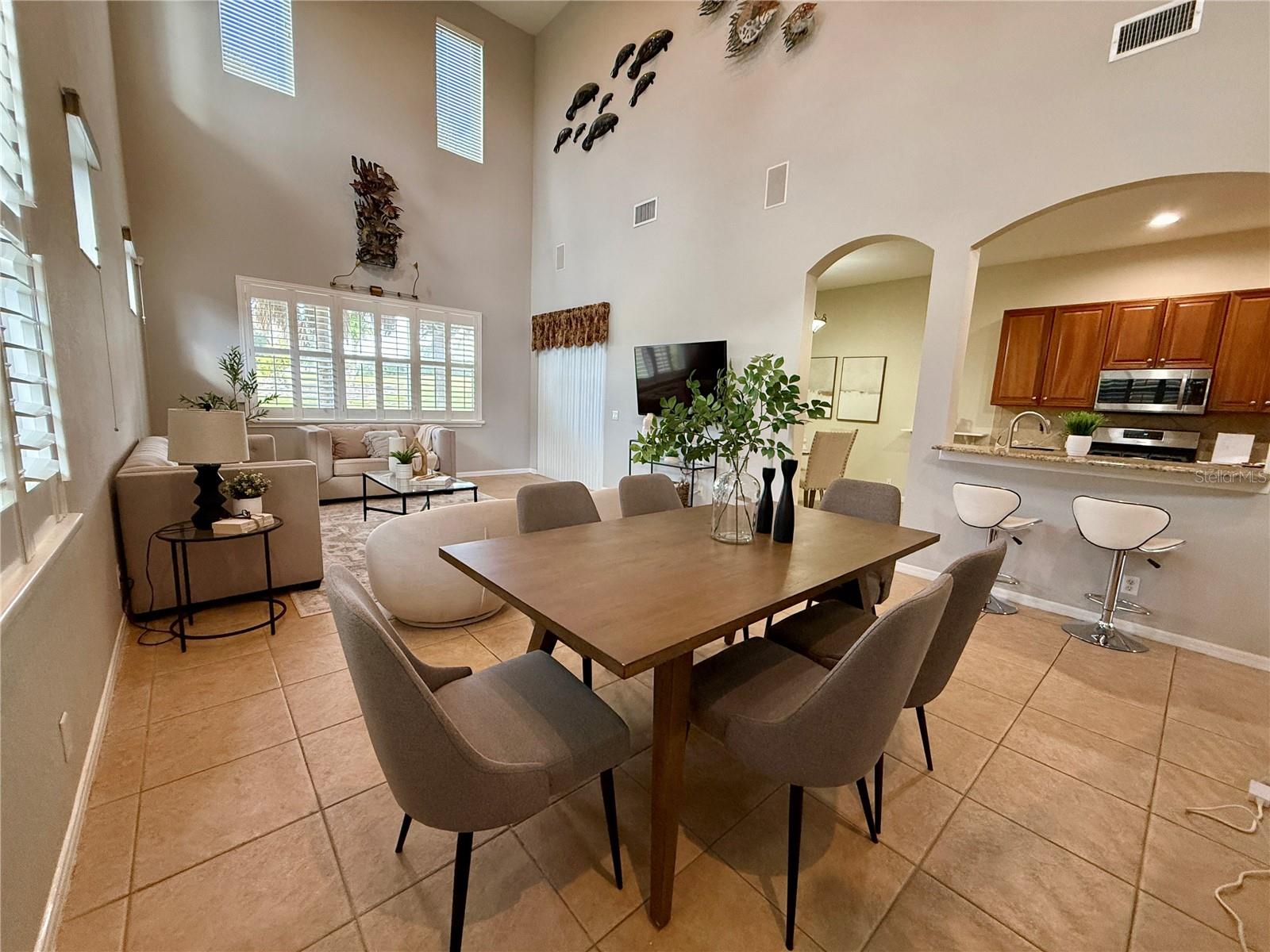Living/dining area with view into the kitchen