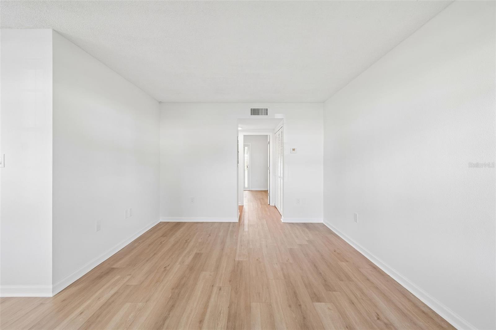 Hall leading to Primary bedroom and Hall bathroom