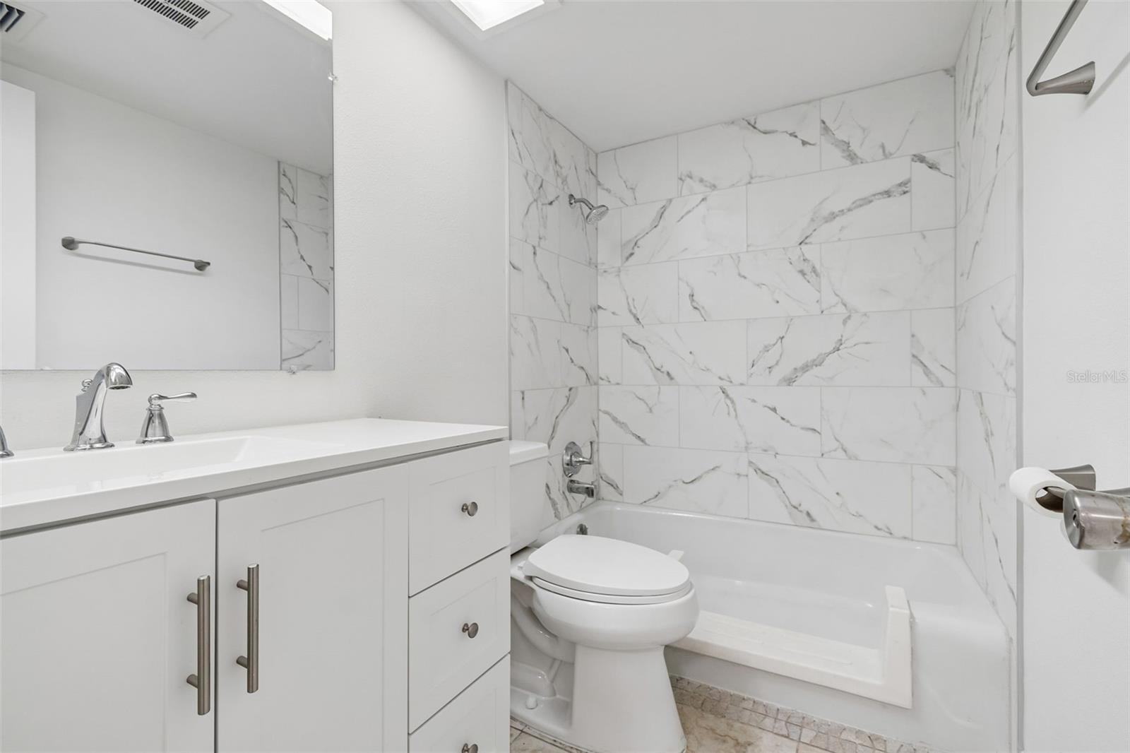 Updated Bathroom with Walk-in tub and shower combo