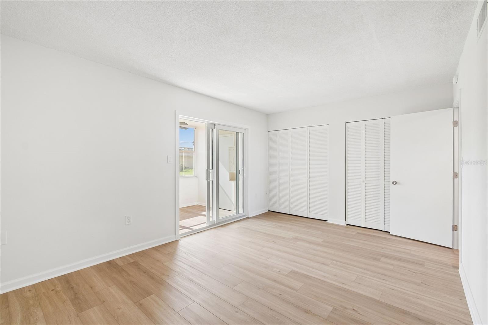 Primary bedroom with double closets